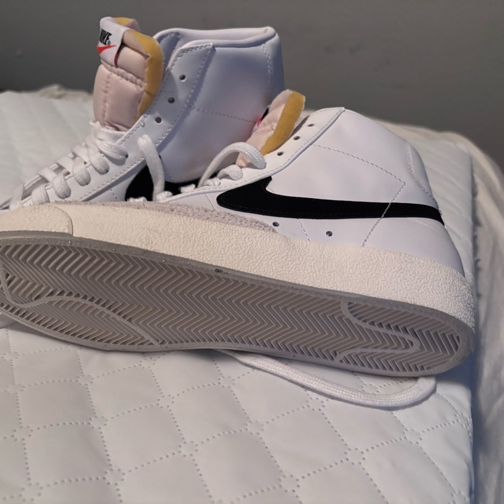 Nike White and Black Blazer high tops. Never been worn.